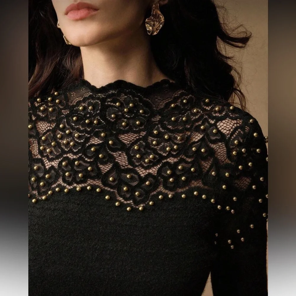 Elegant Black Lace Top with Gold Accents